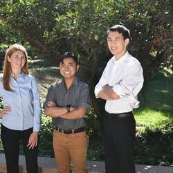 Three students posing.